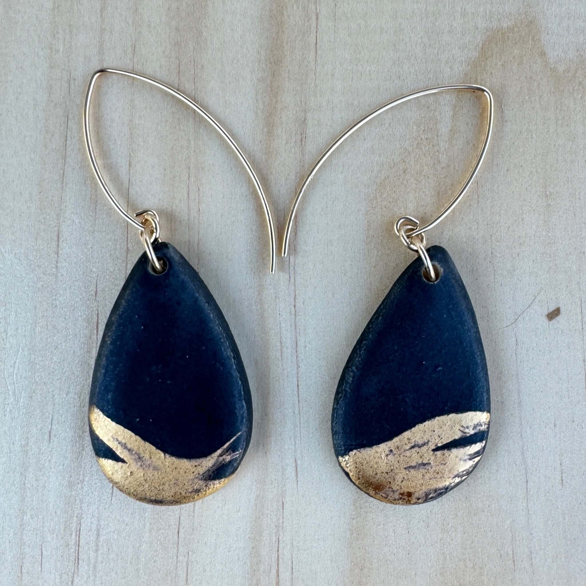 Black and Gold dangle earrings with hand painted gold brushstroke