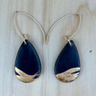 Black & gold teardrop shaped statement earrings with hand painted gold brushstroke across the front