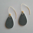 teardrop shaped black matte statement earrings back view