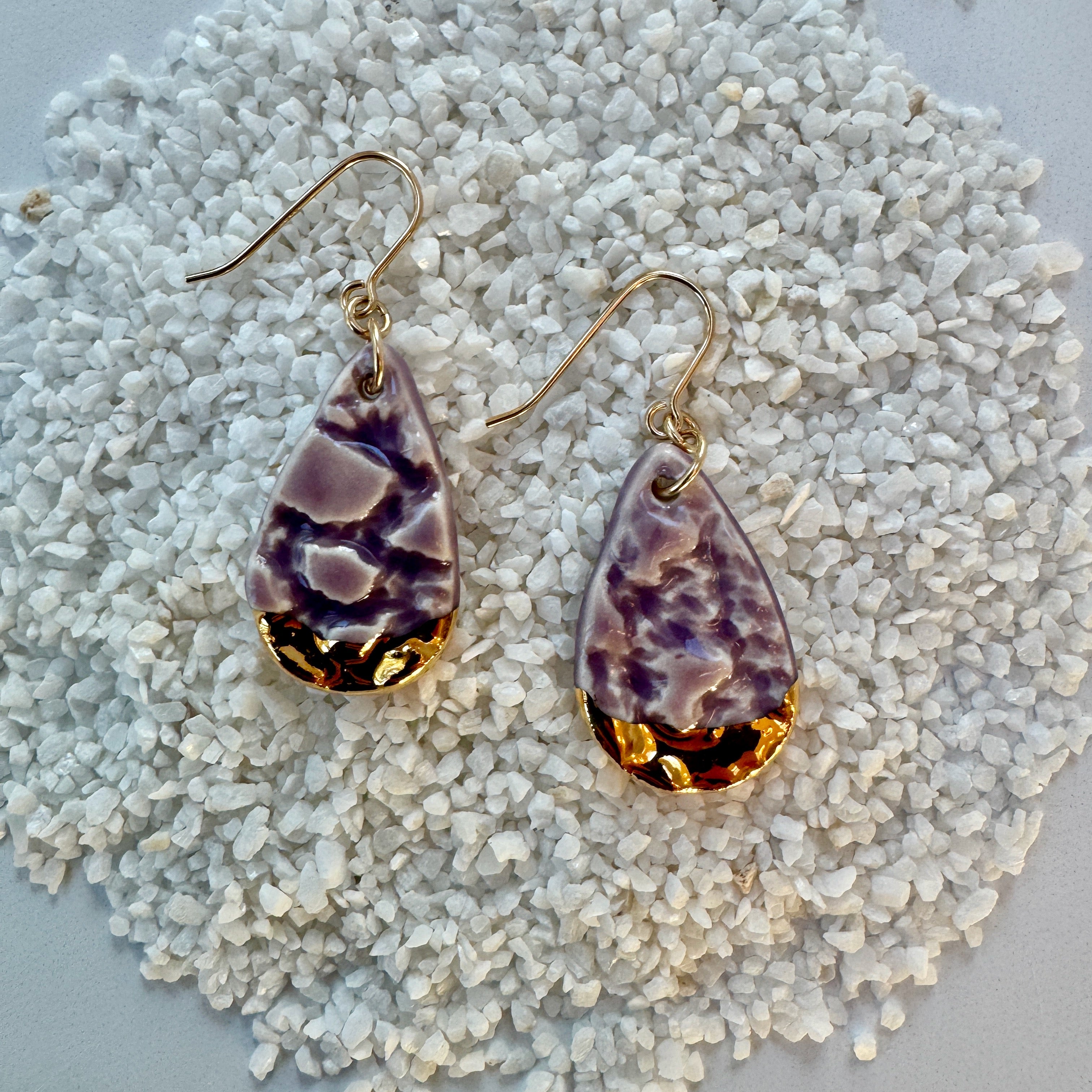 teardrop shaped, lavender color porcelain earrings with lace texture and gold ear wires