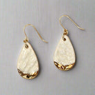 teardrop shaped, white color porcelain earrings with lace texture and gold ear wires