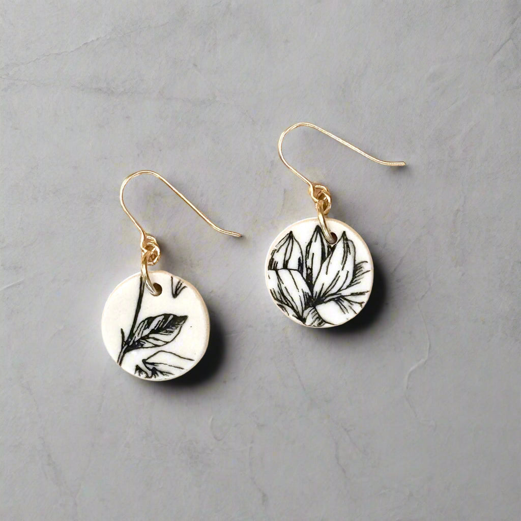 small round black and white floral drop earring with gold filled ear wires