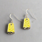 textured yellow earrings with silver accent