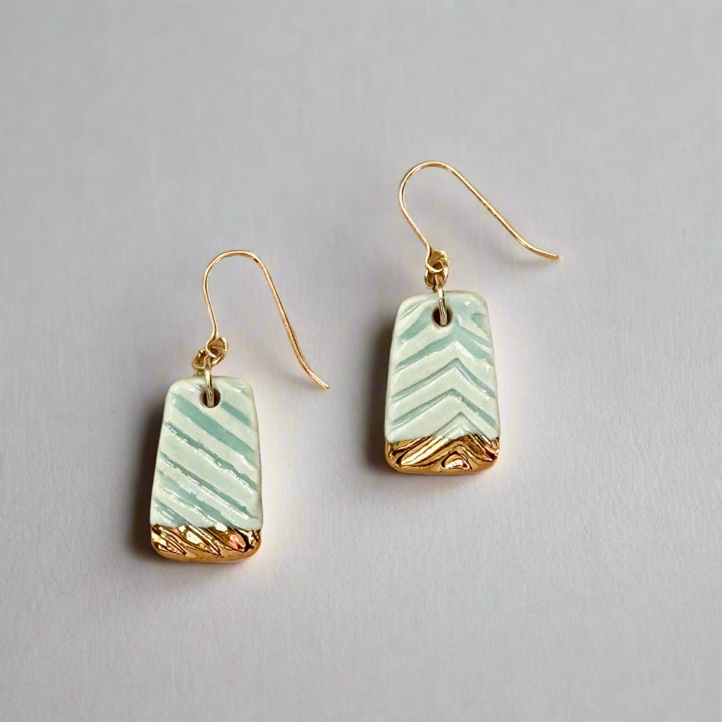 textured aqua earring with gold accent