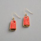 red earring with gold accent back view