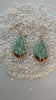 teardrop shaped, aqua color porcelain earrings with lace texture and gold ear wires